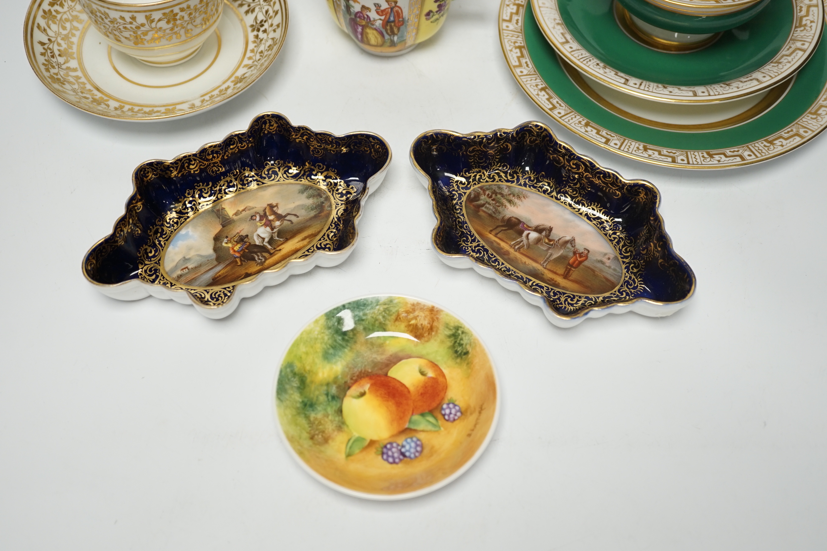 An Austrian chocolate cup and saucer, a similar trio, a BFB Worcester cup and saucer, a pair of spoon trays, etc. , spoon trays 15.5cm wide (14)